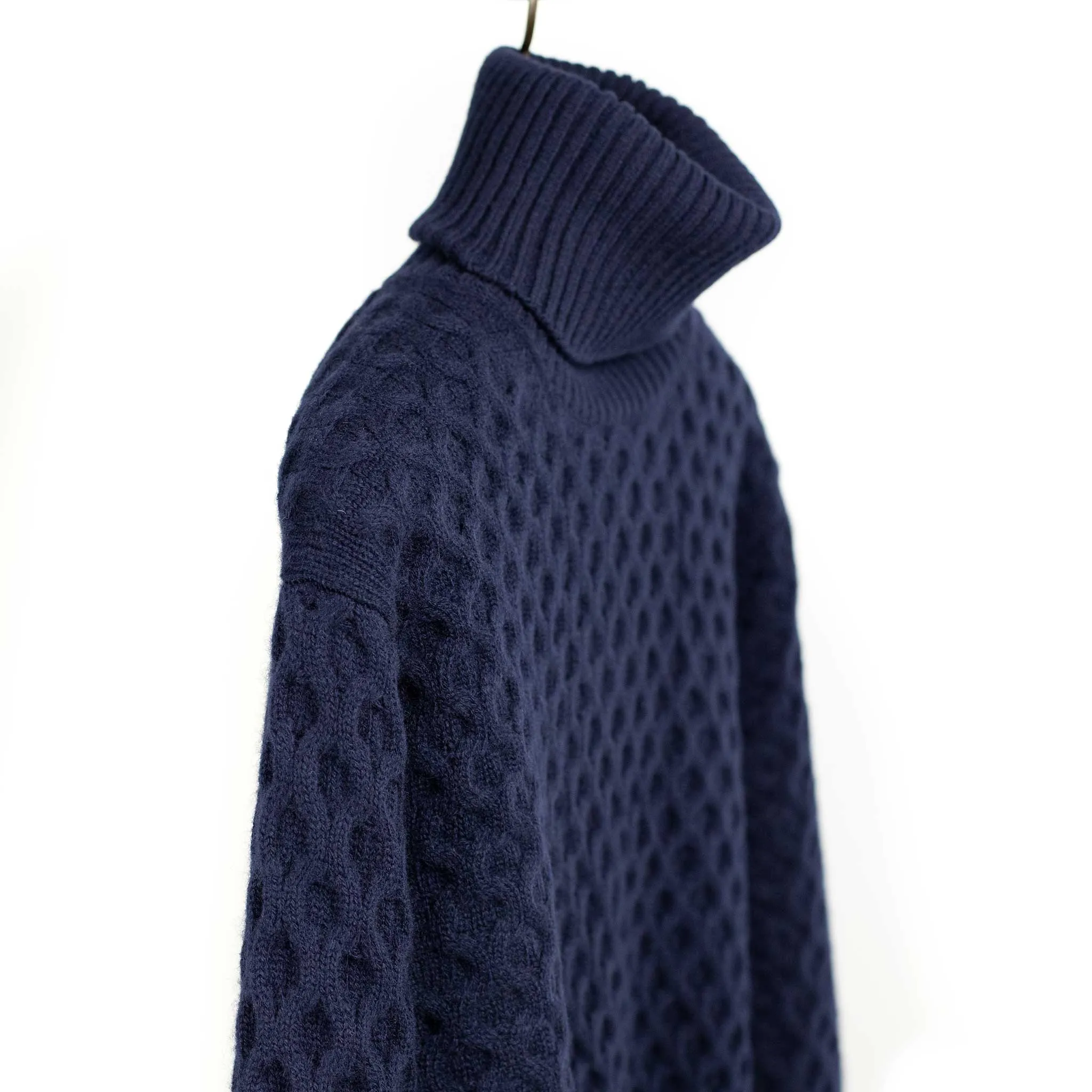Honeycomb cable knit rollneck sweater in navy blue wool and cashmere