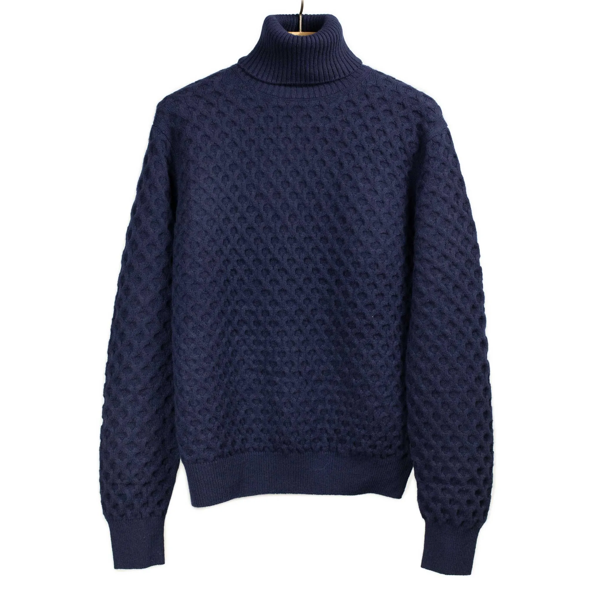 Honeycomb cable knit rollneck sweater in navy blue wool and cashmere
