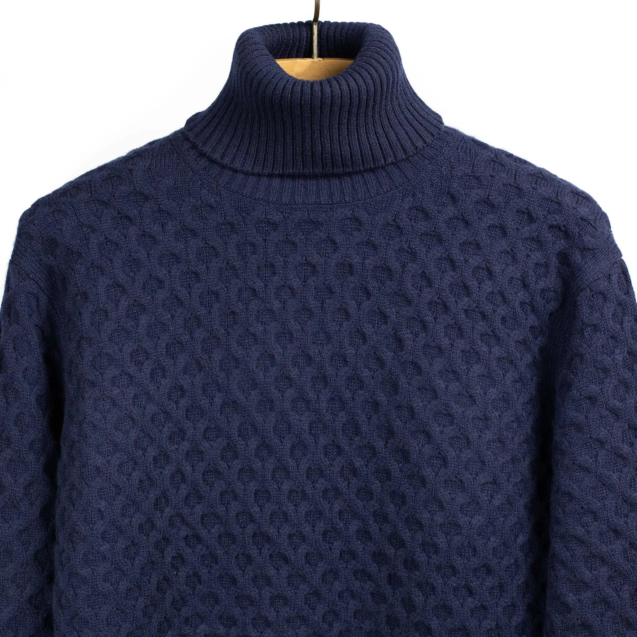 Honeycomb cable knit rollneck sweater in navy blue wool and cashmere